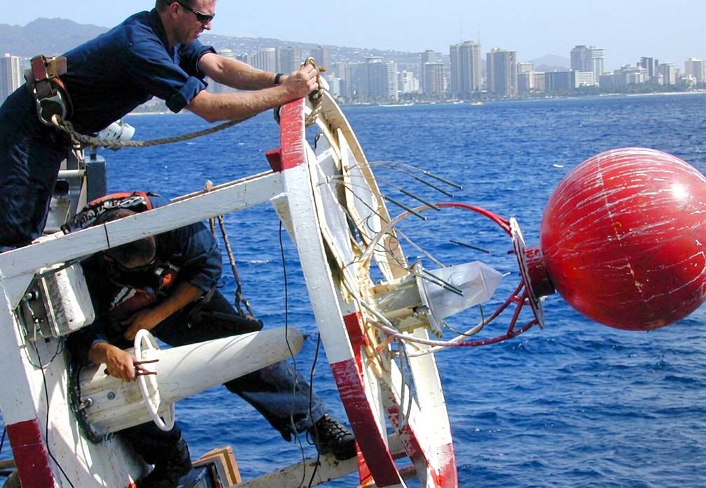 Coast Guard Seamen Repairing a 9X35LWR Buoy