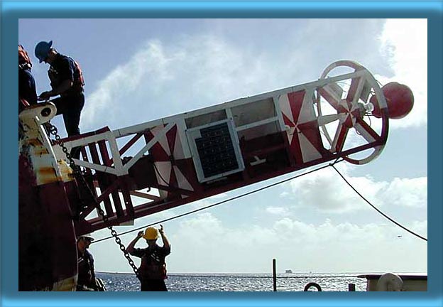 A 9X35LWR Buoy onto a Coast Guard Buoy Tender