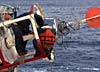 Coast Guard Seamen Repairing a 9X35LWR Buoy